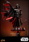 Full-body shot of Darth Vader™ (Battle Damaged) on a display base, featuring his battle-damaged helmet, silhouette cape, while holding a lightsaber in his right hand. (Prototype Shown) View 9