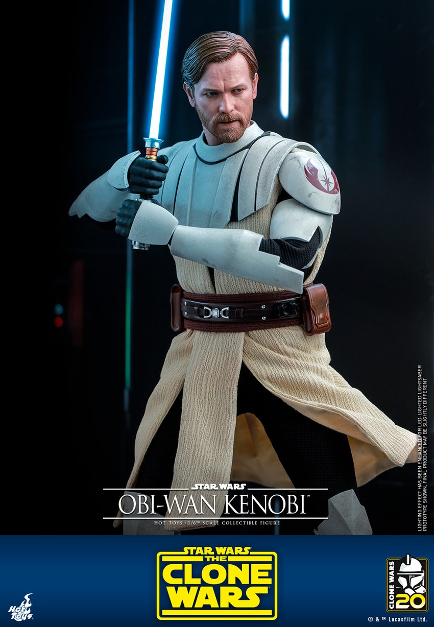 Half-body shot of Obi-Wan Kenobi without his classic brown cape, looking to his left and holding his blue lightsaber with both hands by his right shoulder.- Prototype Shown View 4