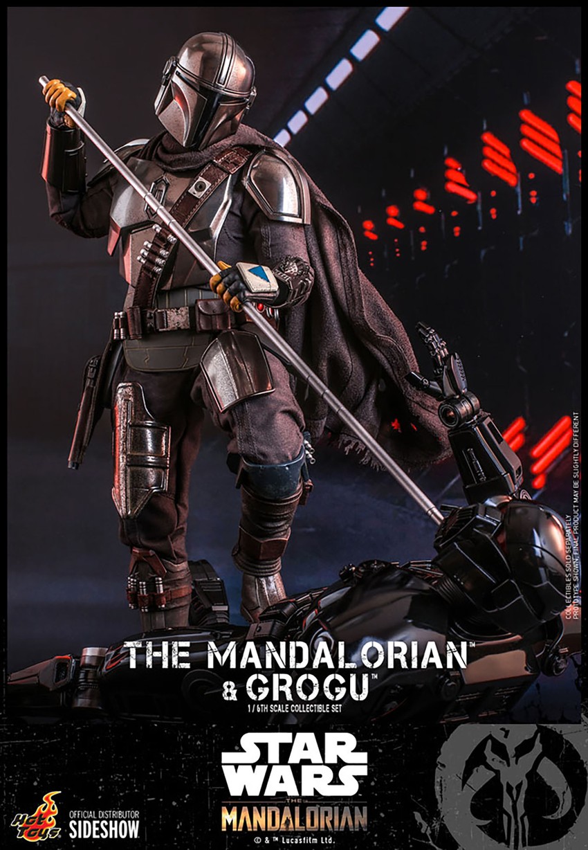 Action shot of The Mandalorian™ stepping on top of a Dark Trooper, pressing his Beskar spear against its head in a battle-ready stance.- Prototype Shown View 6