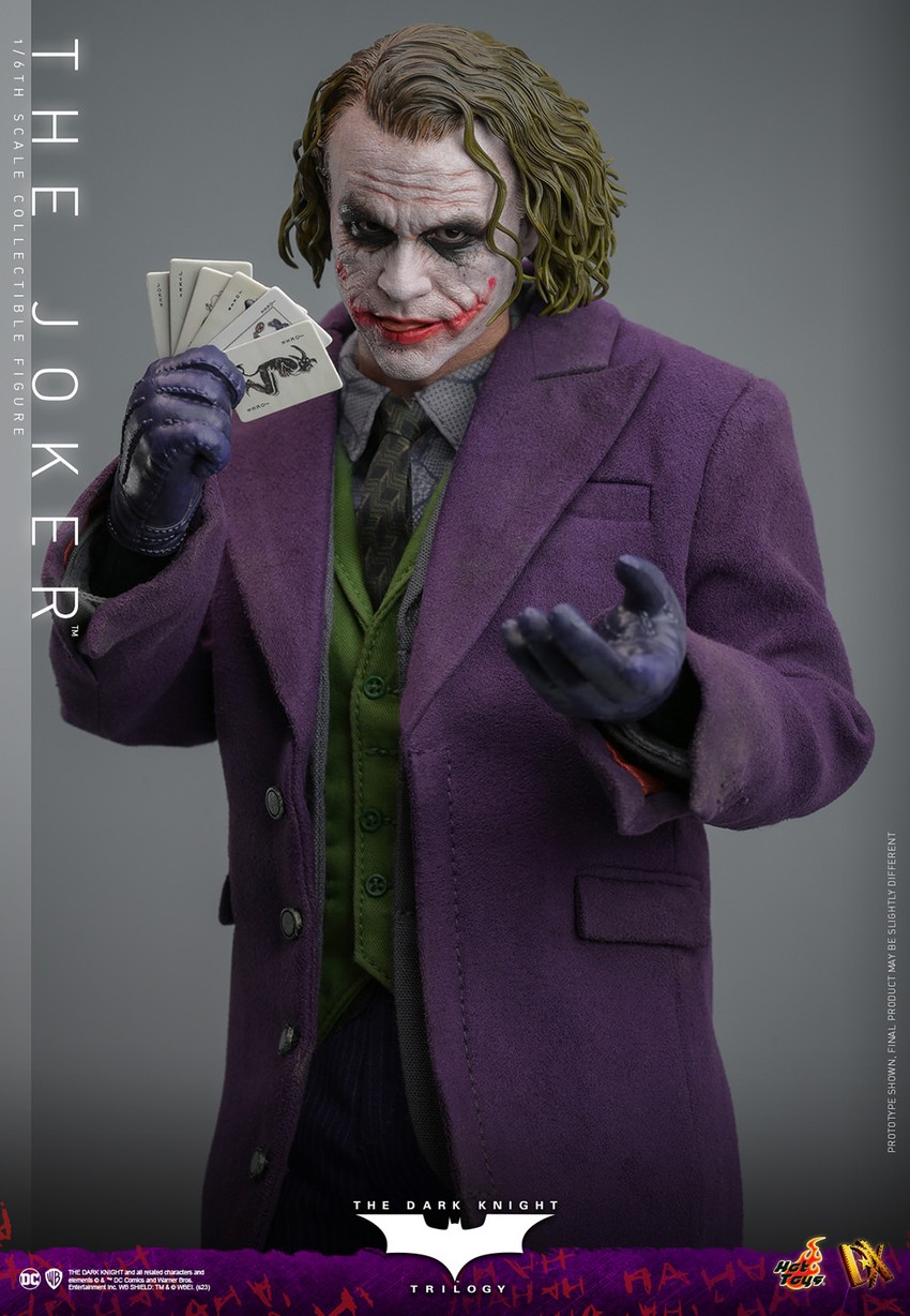 Half body shot of The Joker (Collector Edition) holding fanned out cards in his right hand with left palm up and open, exuding a mischievous expression.- Prototype Shown View 3