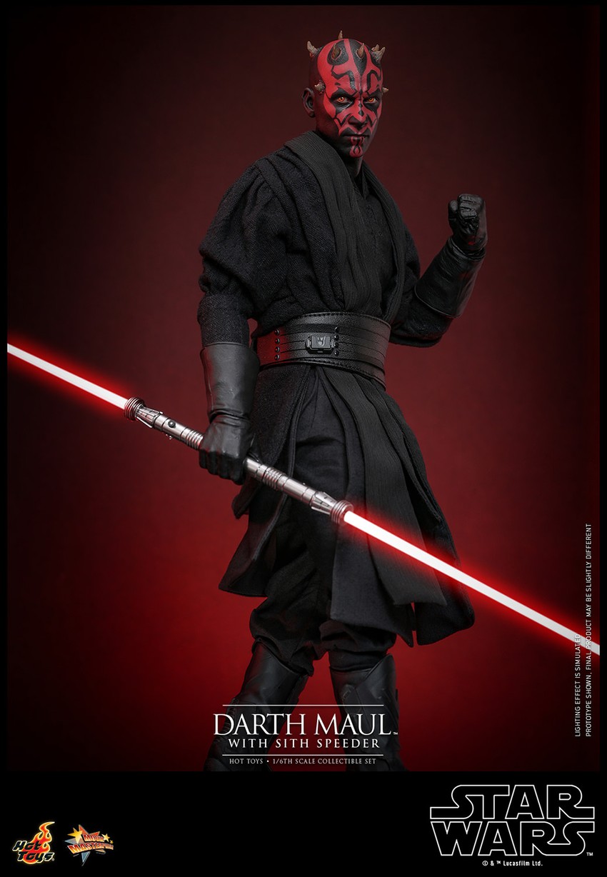 Full body shot of Darth Maul (Sith Speeder) holding a dual-bladed lightsaber in his right hand, with his left arm curled up and upper body turned toward the front. Collector Edition - Prototype Shown View 6